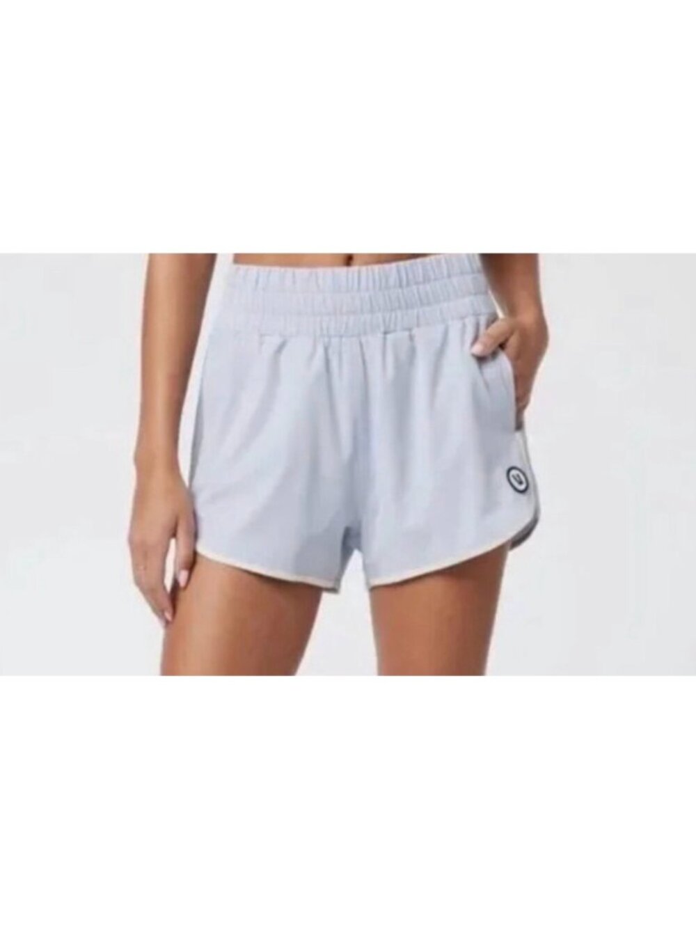 Vuori Women's Cardiff shorts in a light blue shade with a white contrast trim